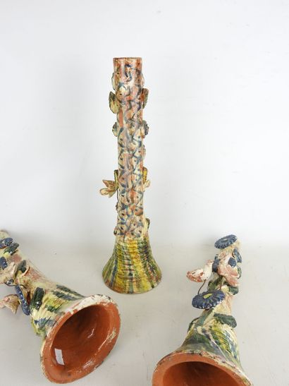 POPULAR ART: Three glazed terracotta candleholders...