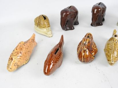 LOT of nine glazed ceramic piggy banks decorated...