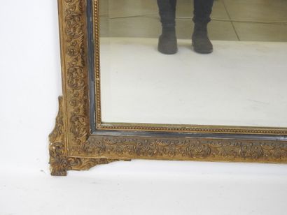 Gilded stuccoed wood MIRROR with foliate...