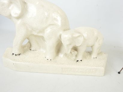 L. FRANCOIS (XXth): Elephants. Crackled ceramic...