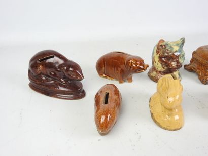LOT of seven glazed ceramic piggy banks decorated...