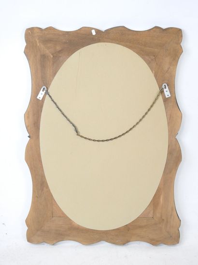 Venetian glass mirror with curved edge and...