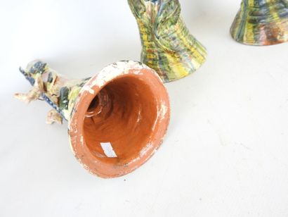 POPULAR ART: Three glazed terracotta candleholders...