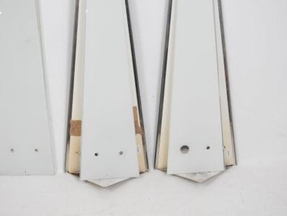 PAIRE d'APPLIQUES de forme triangulaire en...