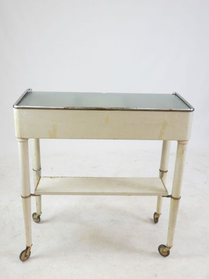 DENTIST'S TABLE on castors in white lacquered...