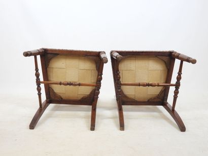 PAIR OF CHAIRS in carved wood, the seat covered...