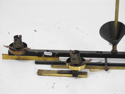 TWO black lacquered and gilded metal SUSPENSIONS...