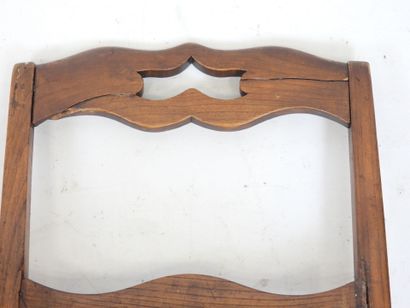 PAIR OF CHAIRS in carved wood, the seat covered...