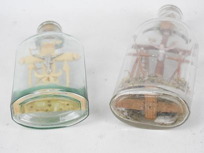TWO EX-VOTOS in glass bottles. H (tallest):...