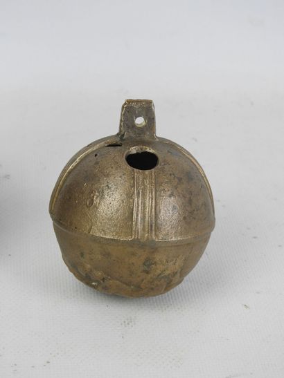 TWO bronze GRELOTS, one decorated with horses,...