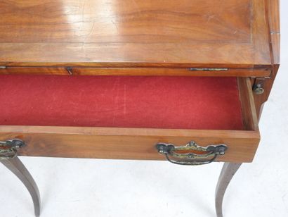 Walnut veneered sloping desk, opening with...