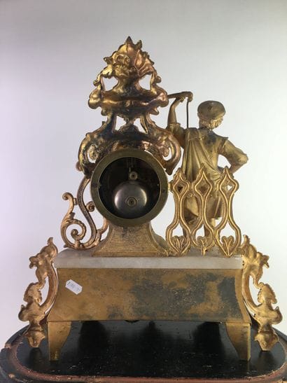 PENDULE in chased and gilded regule, the...