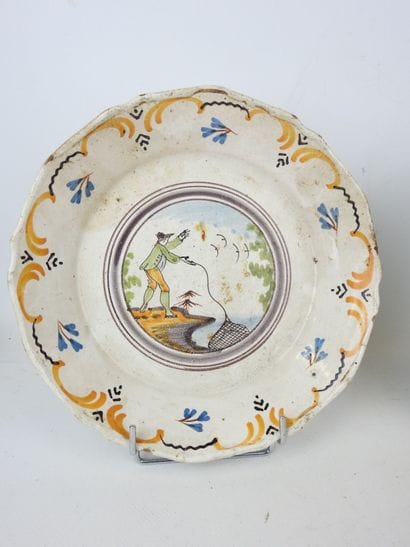 NEVERS: Two earthenware plates with polychrome...