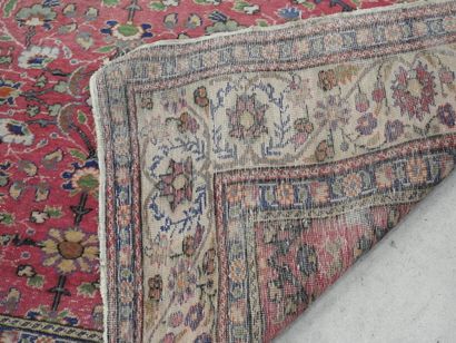 TWO WOOL RUGS, one Iran with floral design...