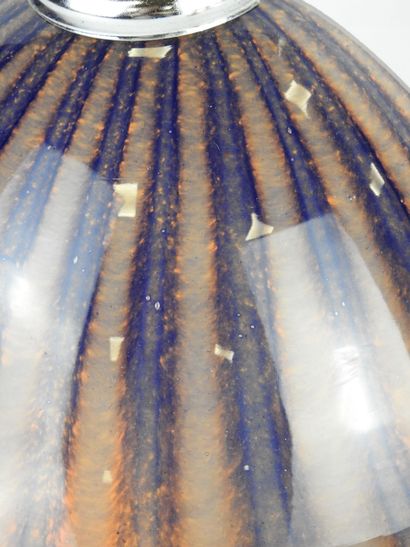 Glass sconce decorated with mauve drips on...