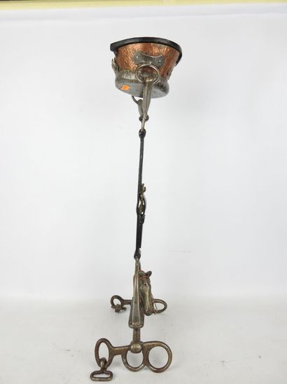 Standing ashtray in wrought iron and copper...