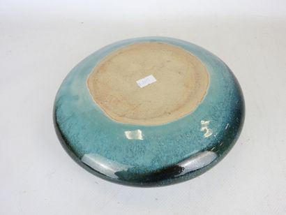 Green enameled stoneware ovoid vase with...