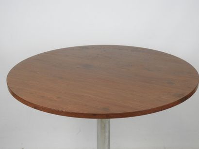 Circular TABLE with Formica top resting on...