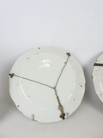 CENTER: Three earthenware plates with floral...