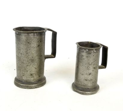 TWO pewter MEASUREMENTS. One signed BREMONTIER,...