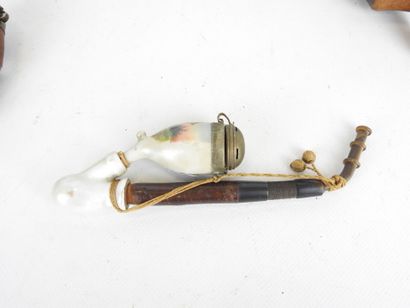 LOT of pipes and calumet in carved wood and...