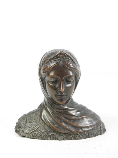 BUST of a young woman in bronze with brown...