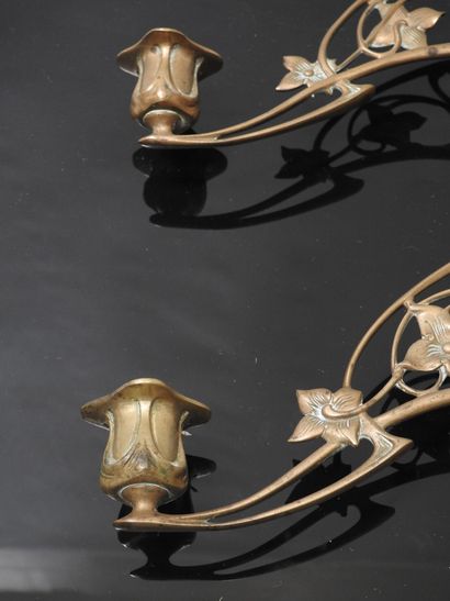 PLEYEL: Pair of two-light sconces in bronze....