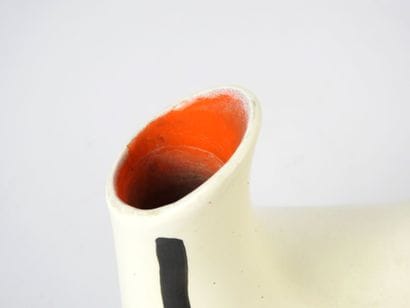 J BURG (20th): White, black and orange ceramic...