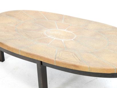 LOW TABLE with oval top in sandstone tile...