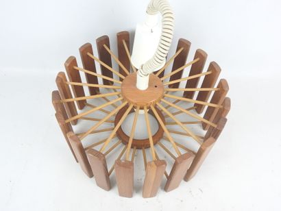 In the style of Pierre CHAPO: Circular chandelier...