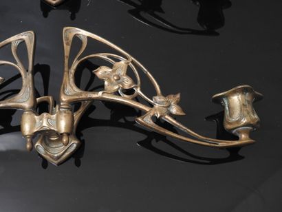 PLEYEL: Pair of two-light sconces in bronze....