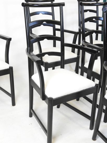 SIX CHAIRS in blackened wood, curly seat....