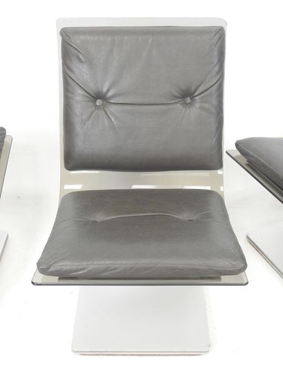 Maison JANSEN: Three armchairs in smoked...