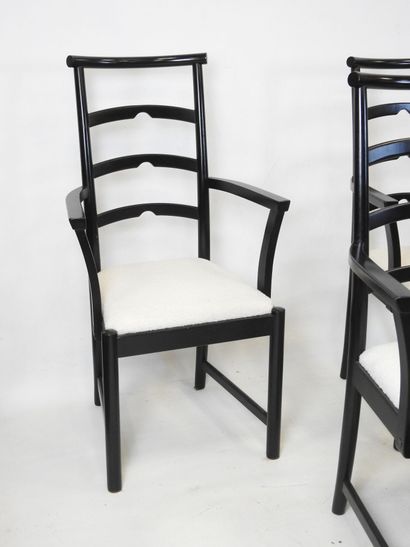 SIX CHAIRS in blackened wood, curly seat....