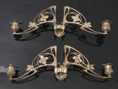 PLEYEL: Pair of two-light sconces in bronze....