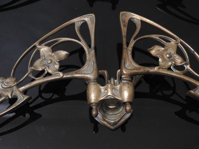 PLEYEL: Pair of two-light sconces in bronze....