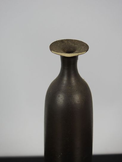 FIVE VASES and ONE CUP in stoneware. It includes...