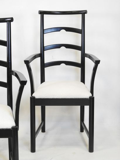 SIX CHAIRS in blackened wood, curly seat....