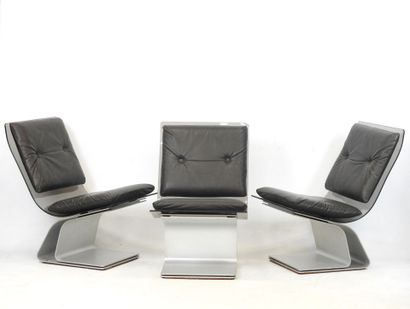 Maison JANSEN: Three armchairs in smoked...