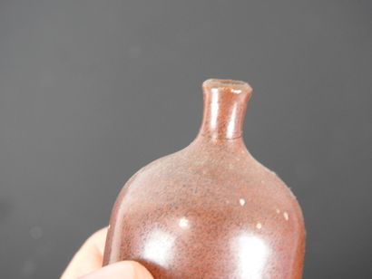 FIVE VASES and ONE CUP in stoneware. It includes...
