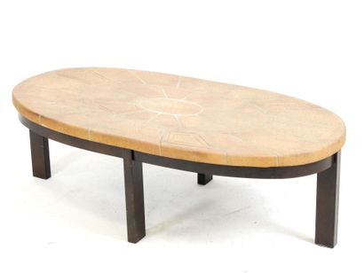 LOW TABLE with oval top in sandstone tile...