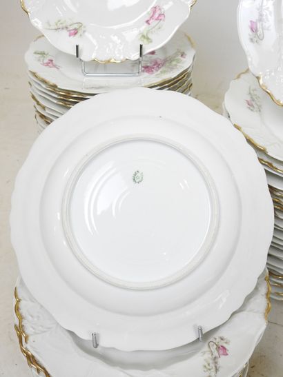 LIMOGES: Part of a porcelain dinner service...