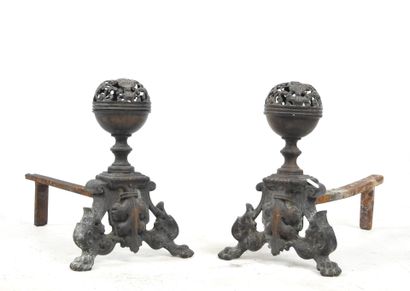 Pair of cast-iron CHENETS resting on two...