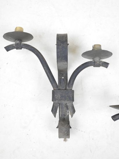 Two wrought-iron APPLIQUES with two asymmetrical...