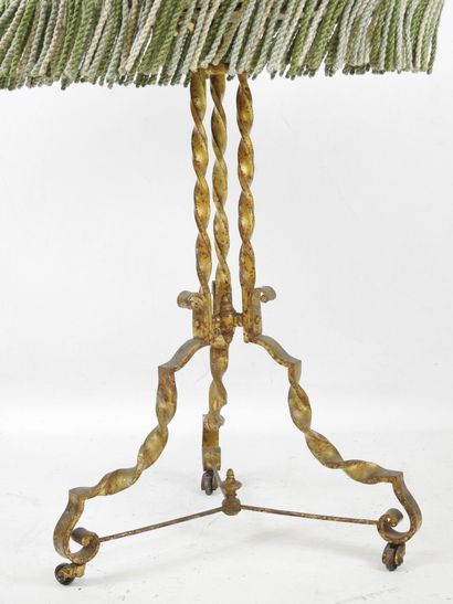 Gilded, twisted wrought-iron tilt-top GUERIDON,...