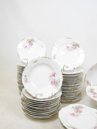 LIMOGES: Part of a porcelain dinner service...
