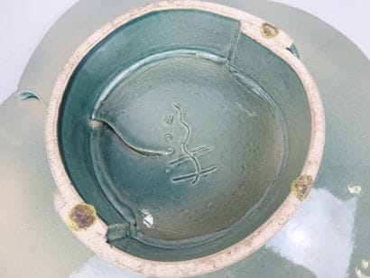 CUP on foot in green ceramic imitating malachite....