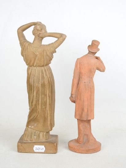 FEMALE à l'Antique styling her hair, terracotta...