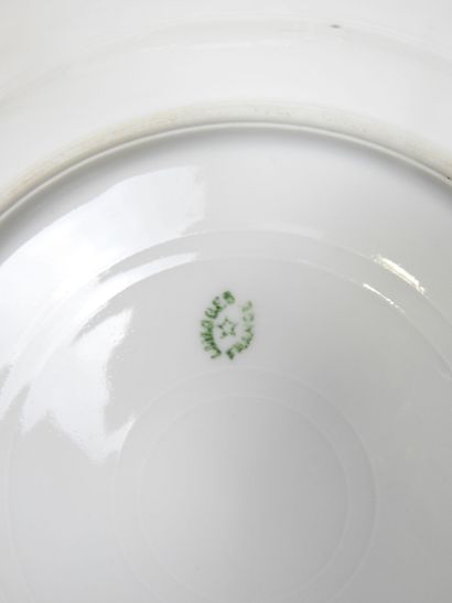 LIMOGES: Part of a porcelain dinner service...