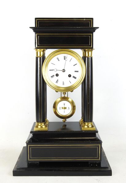 Black lacquered wood and gilt brass portico...